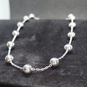 Elegant Silver Beaded Necklace